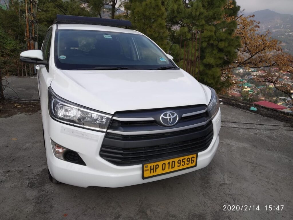 Toyota Innova taxi ready for a comfortable journey through Himachal Pradesh, ideal for family trips and sightseeing tours.